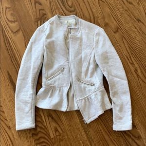 Zip up with peplum In sweater material